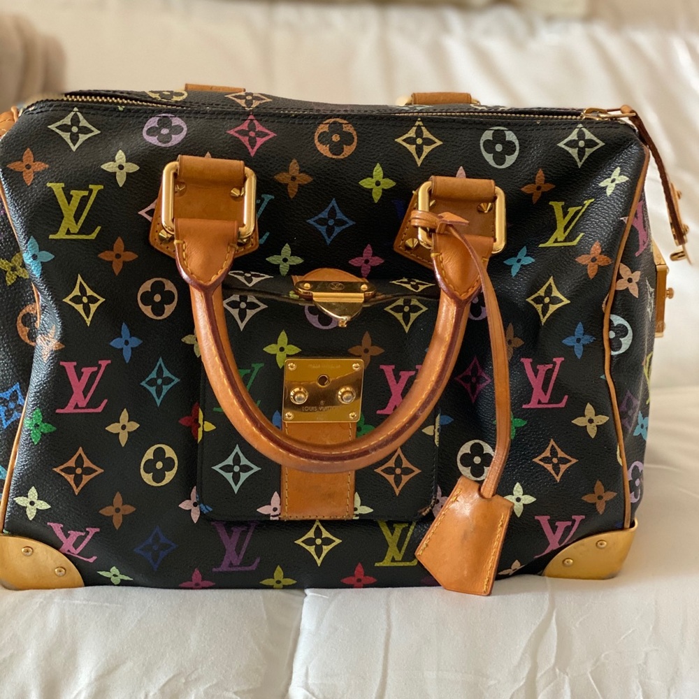 Louis Vuitton purse. Black monogram, trunk style.